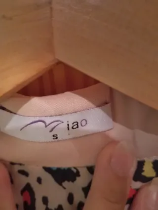 Chaqueta de traje beige con forro estampado