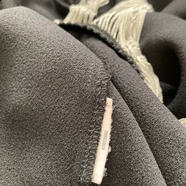 Blusa Mango negra con flecos