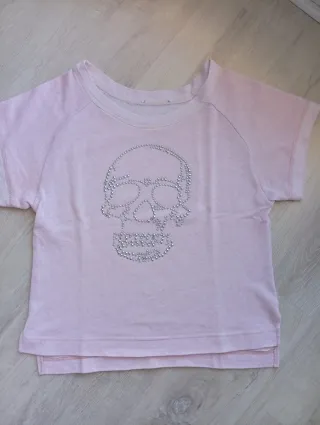 Jersey mujer rosa con calavera plateada