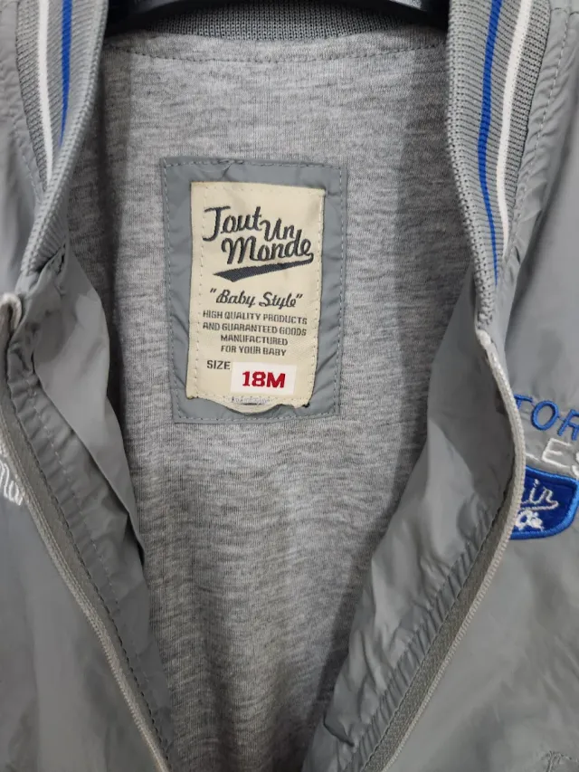 Chaqueta estilo bomber gris y blanca