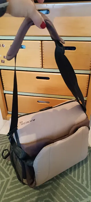 Trona portátil para bebé con diseño de mono