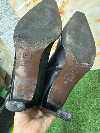 Stivali neri in pelle con tacco