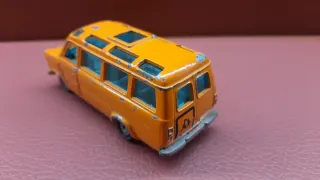 Furgoneta scolastica arancione Siku