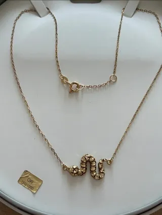 Cadena de oro 18k con colgante de serpiente