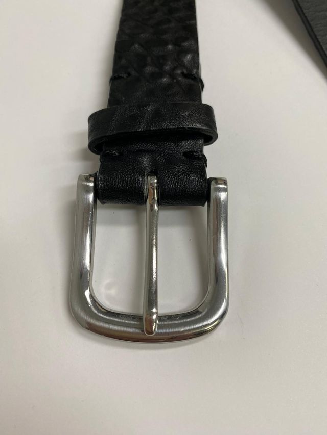 Cinturón negro con cadena