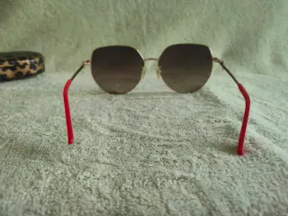 GUESS - Gafas de sol doradas y rojas