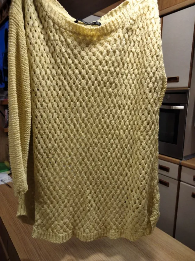 Jersey rejilla amarillo .50 de hombros y65 de larg