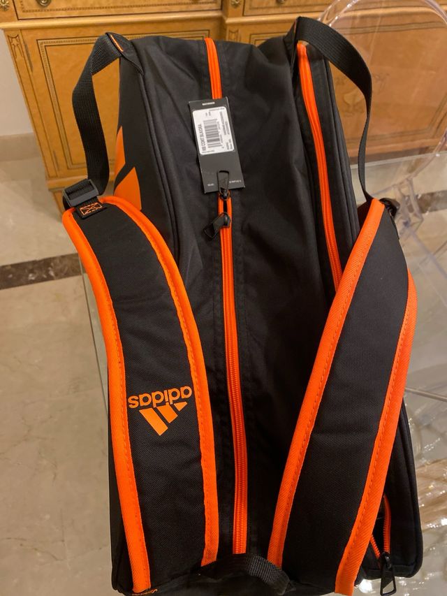 Bolsa de pádel Adidas negra y naranja