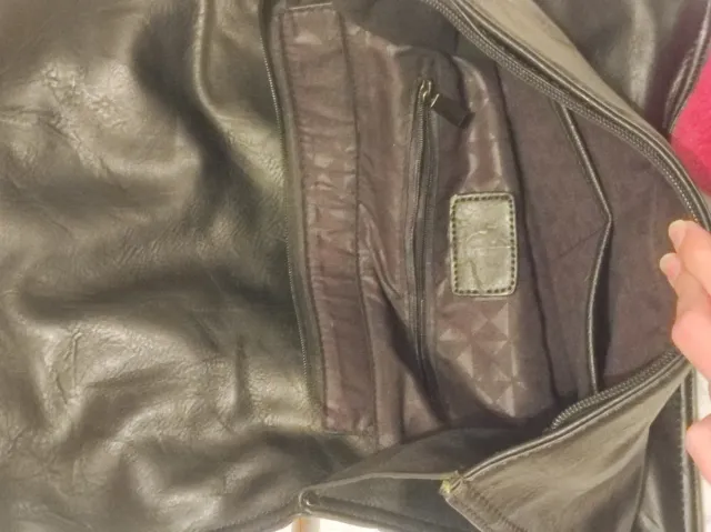 Bolso negro con detalles marrones