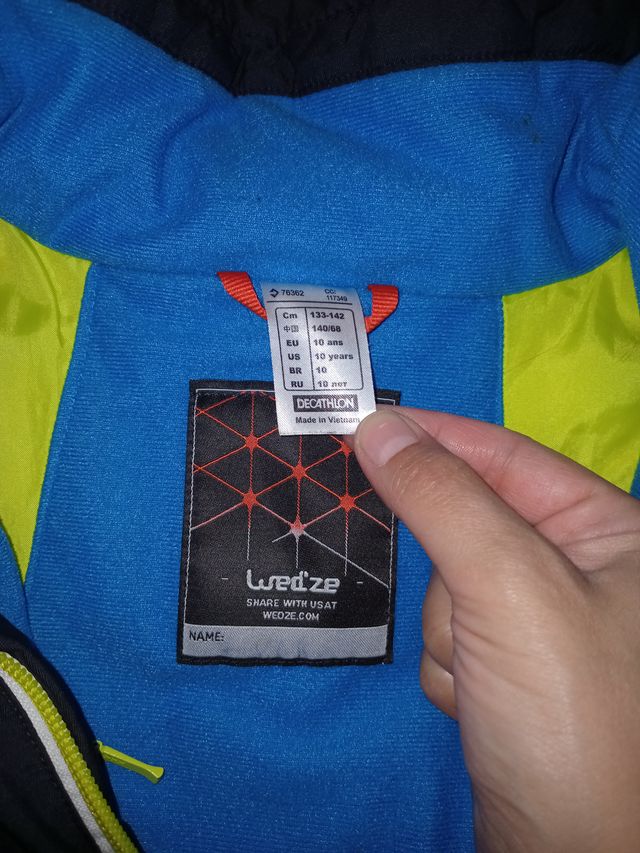 Abrigo infantil Wedze talla 10 años leer bien