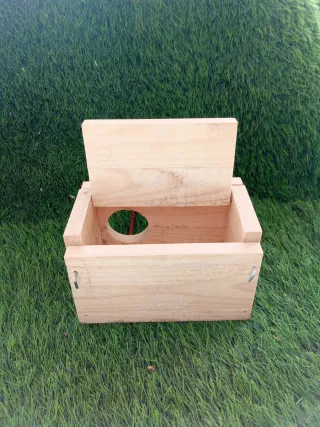 Nido de madera para periquitos