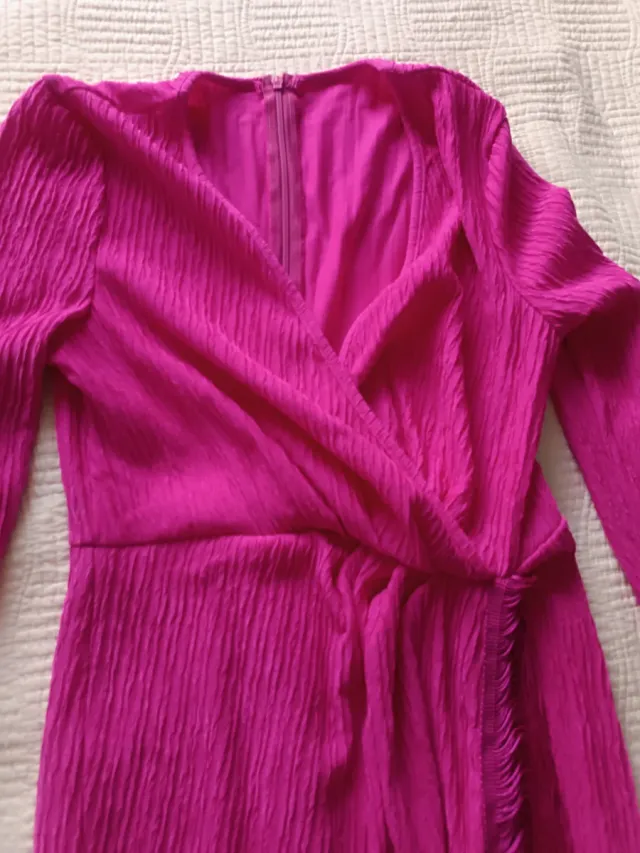 Abito fucsia con frange