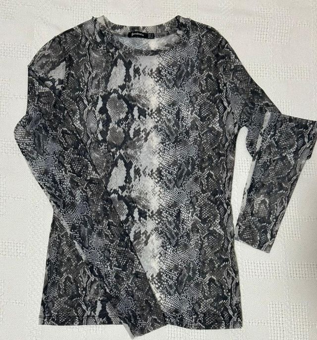 Blusa de gasa entallada