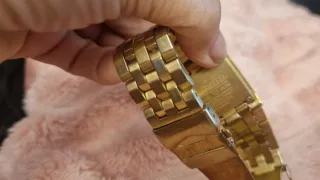 Reloj Nixon Dorado y Blanco