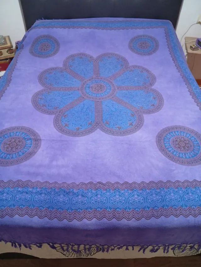 Manta sofá/cama floral azul y morado