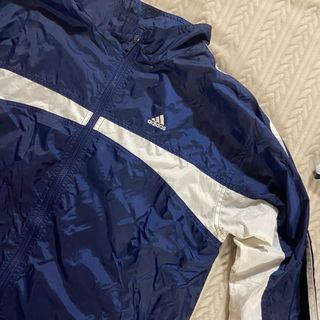 Giacca a vento Adidas blu e bianca
