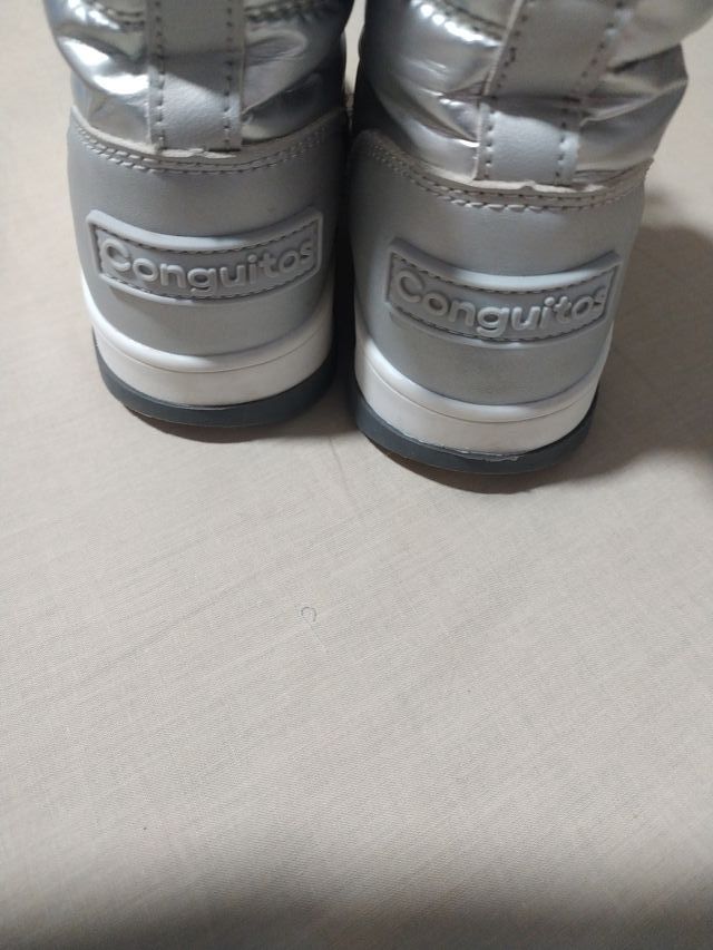 Botas plateadas niña invierno