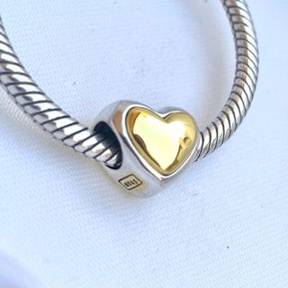 CHARM CORAZÓN DORADO Y PLATA