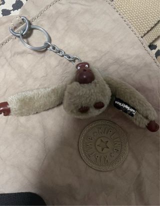 Borsetta Kipling grigia con scimmietta