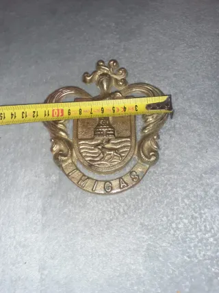 Insignia latón-bronce UMIGA 13x12 ver