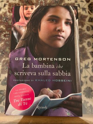 la bambina che scriveva sulla sabbia