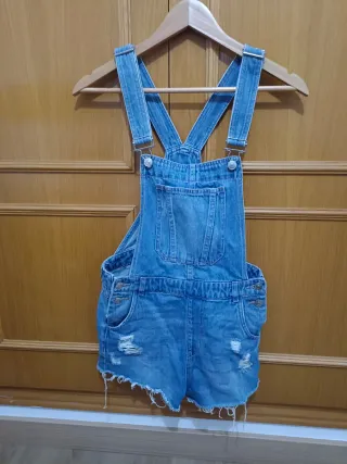 Peto corto vaquero desgastado