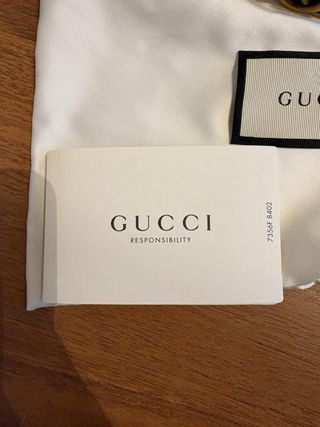 Cintura Gucci sottile oro e nera
