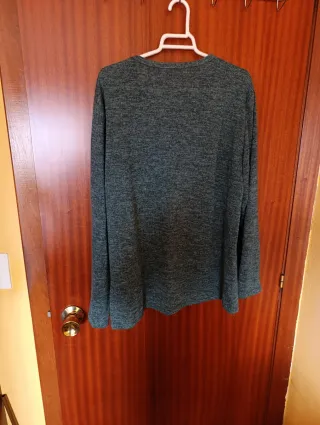 Jersey verde con hoja brillante