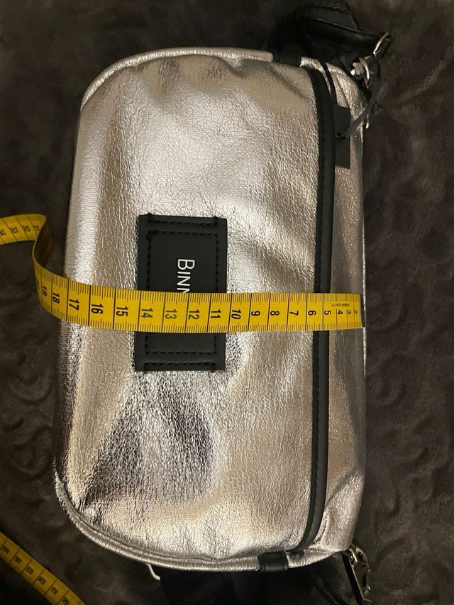 Bolso plateado Binnari, Nuevo