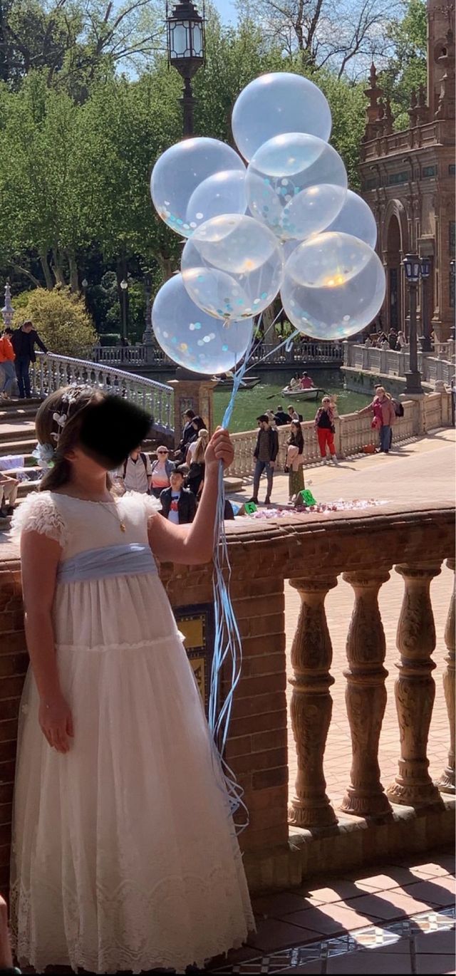 Vestido de comunión blanco con lazada celeste
