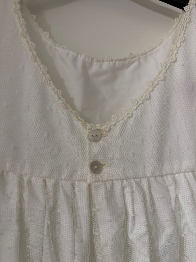 Vestido de comunión blanco con lazada celeste