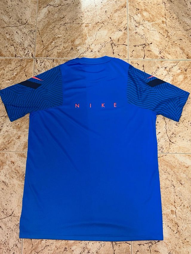 Camiseta deportiva Nike azul