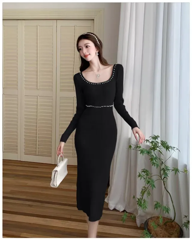 Vestido negro elegante con perlas