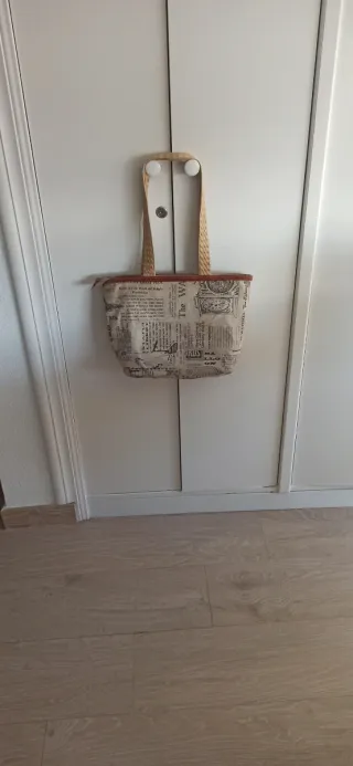 Bolso estampado bicicleta y letras