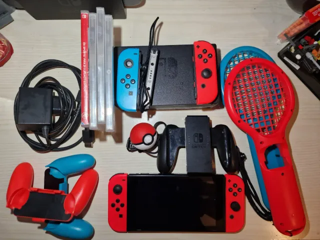 Nintendo Switch V2 + 4 giochi + accessori