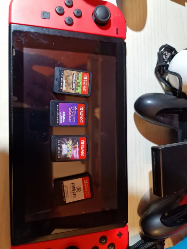 Nintendo Switch V2 + 4 giochi + accessori