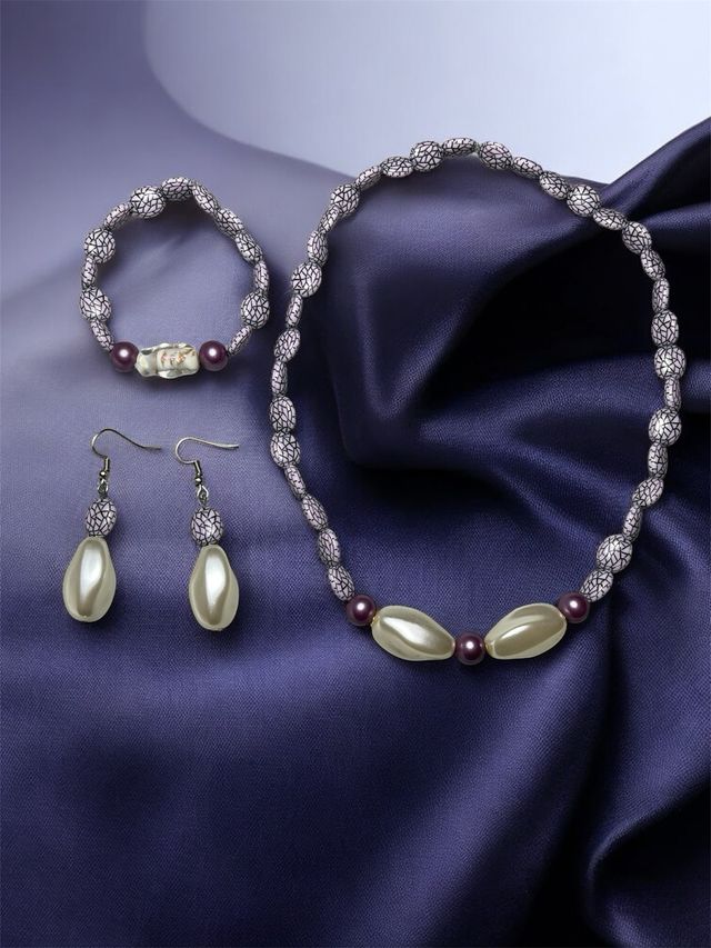 Conjunto collar, pulsera y pendientes