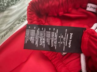 Pantaloni Palm Angels Rossi