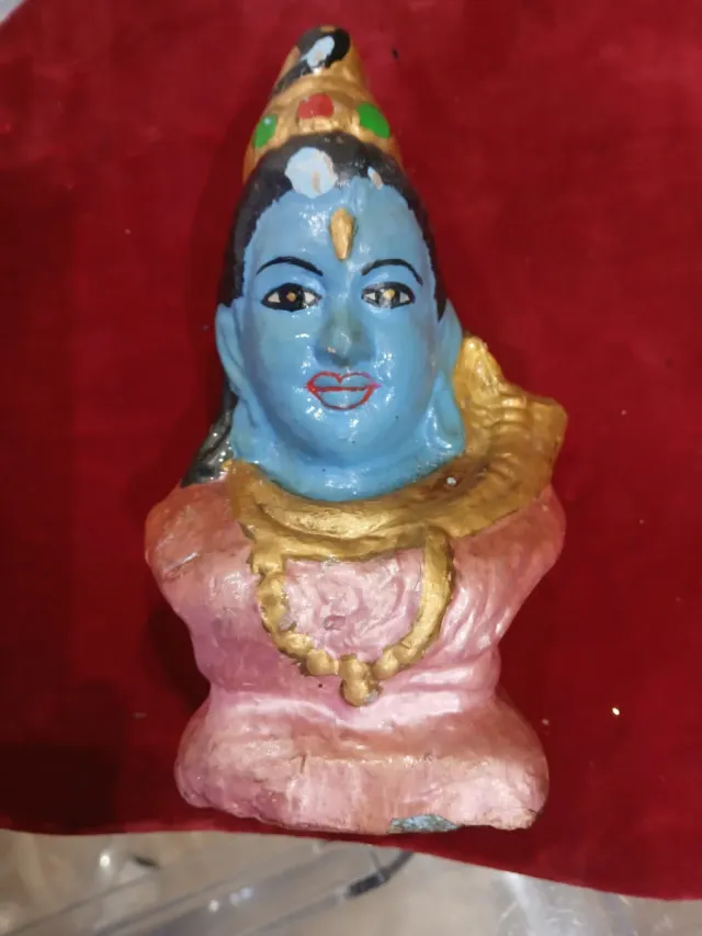 Figura antigua de deidad azul