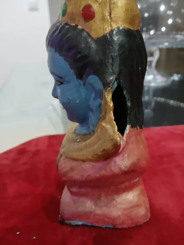 Figura antigua de deidad azul