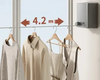 Tendedero retráctil rosa NUEVO