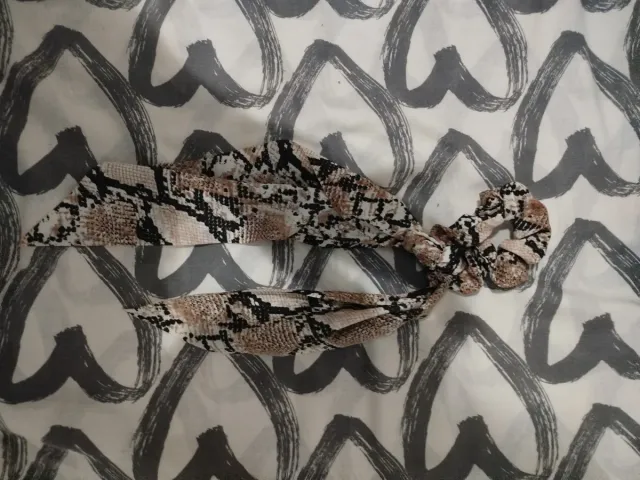 Coletero con estampado de serpiente