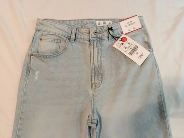 Pantalón tejano mom alto