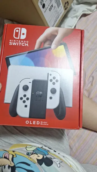 Nintendo Switch OLED+  juego Mario Nueva Sin Abrir