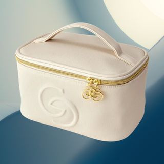 Neceser beige elegante con detalles dorados