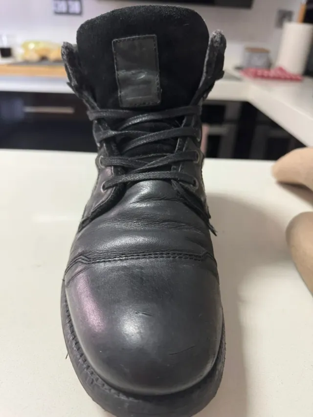 Botas de piel hombre negras