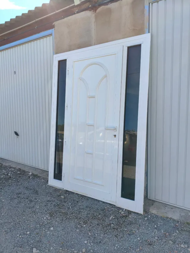 Puerta de entrada aluminio 2 fijos de cristal