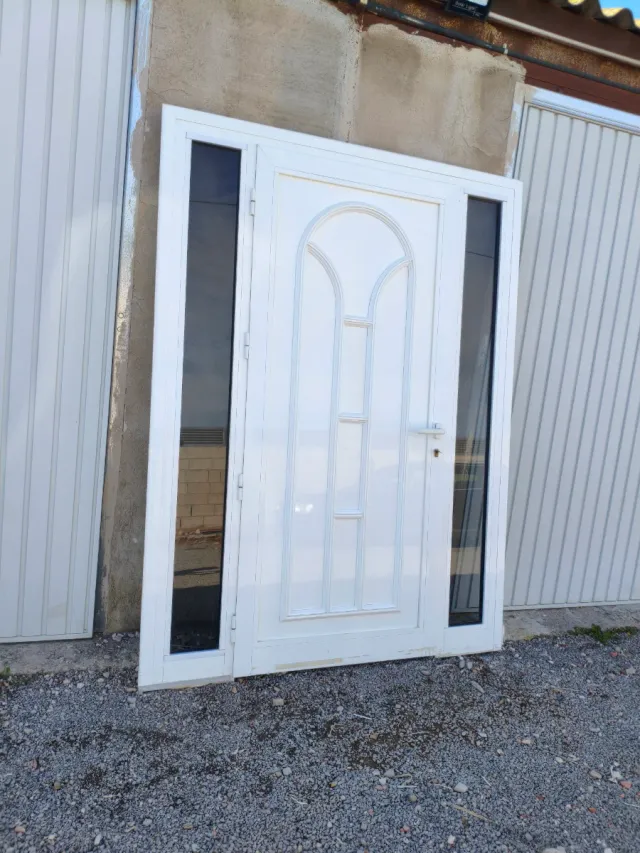 Puerta de entrada aluminio 2 fijos de cristal