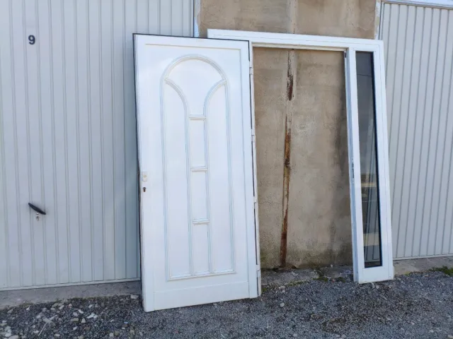 Puerta de entrada aluminio 2 fijos de cristal