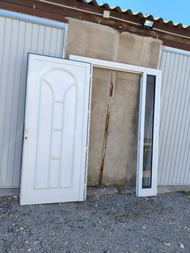 Puerta de entrada aluminio 2 fijos de cristal